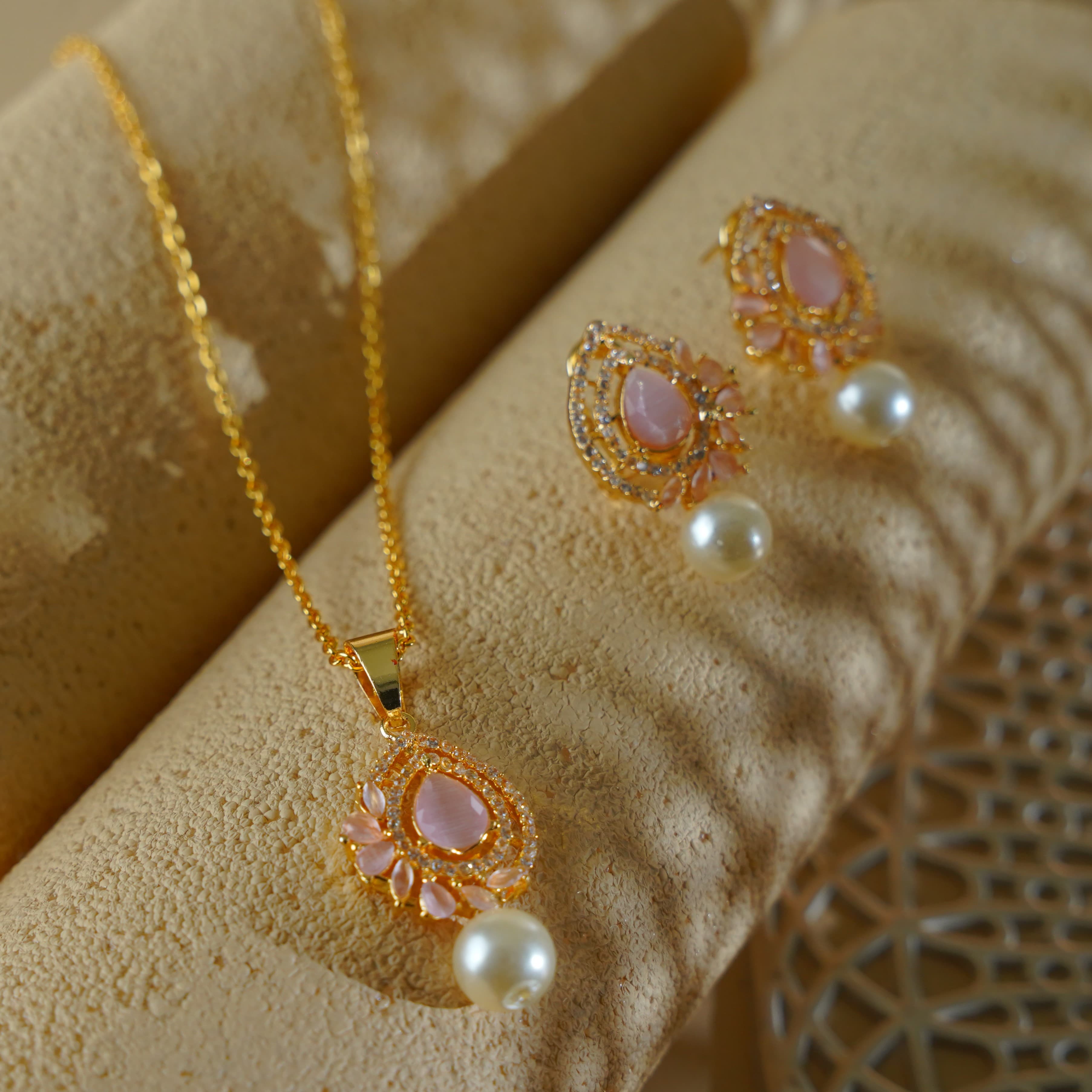 zanvik-blush-dewdrop-zirconia-earrings-ring-and-pendant-set