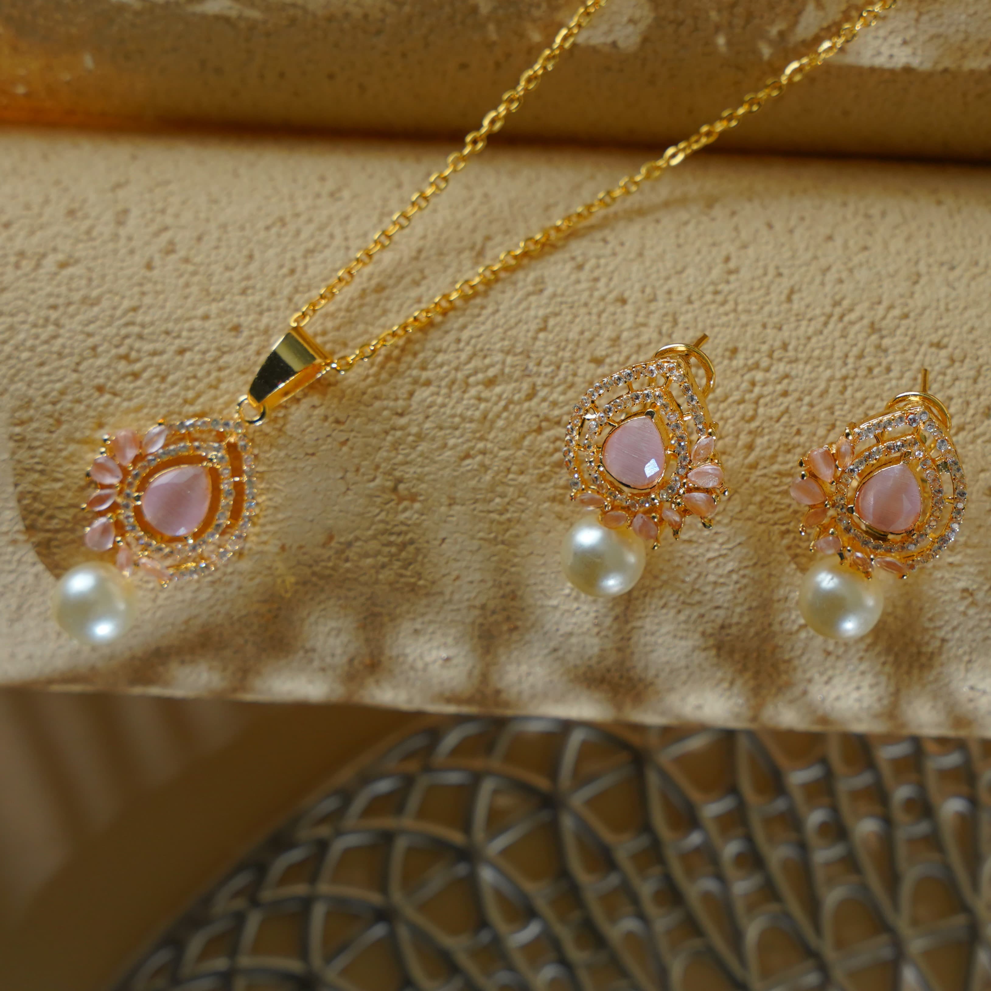 zanvik-blush-dewdrop-zirconia-earrings-ring-and-pendant-set