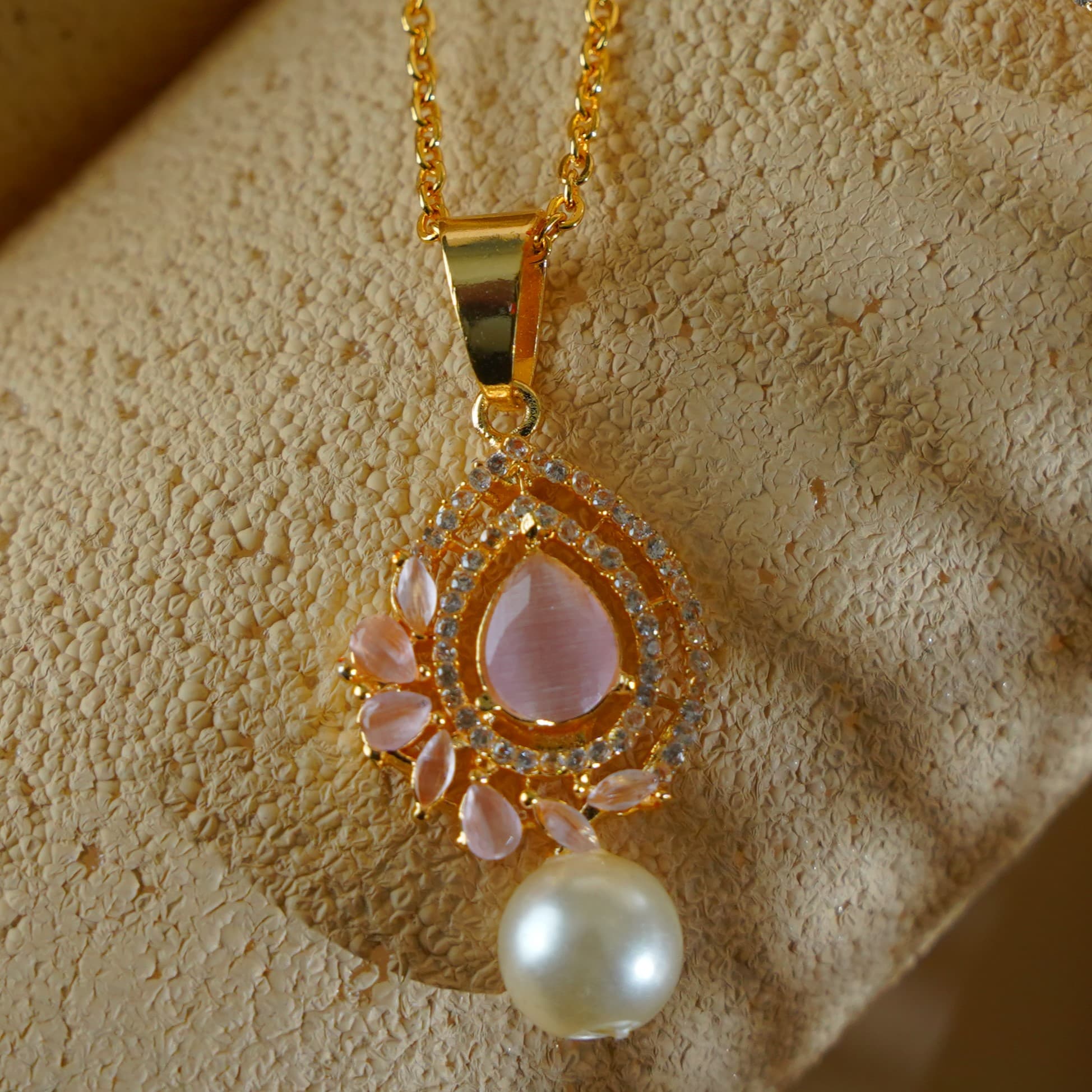 zanvik-blush-dewdrop-zirconia-earrings-ring-and-pendant-set